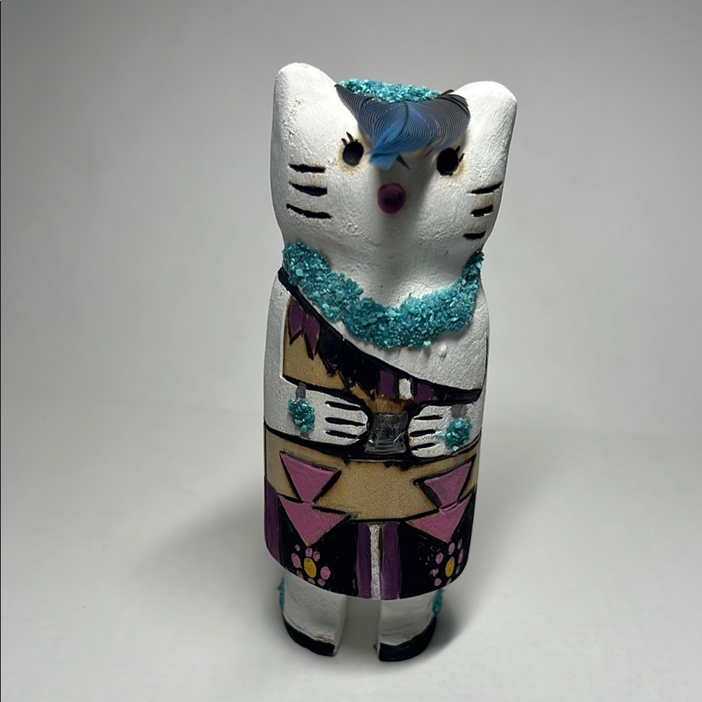 Handcrafted Zuni male Cat Figurine dressed Ian a traditional outfit.